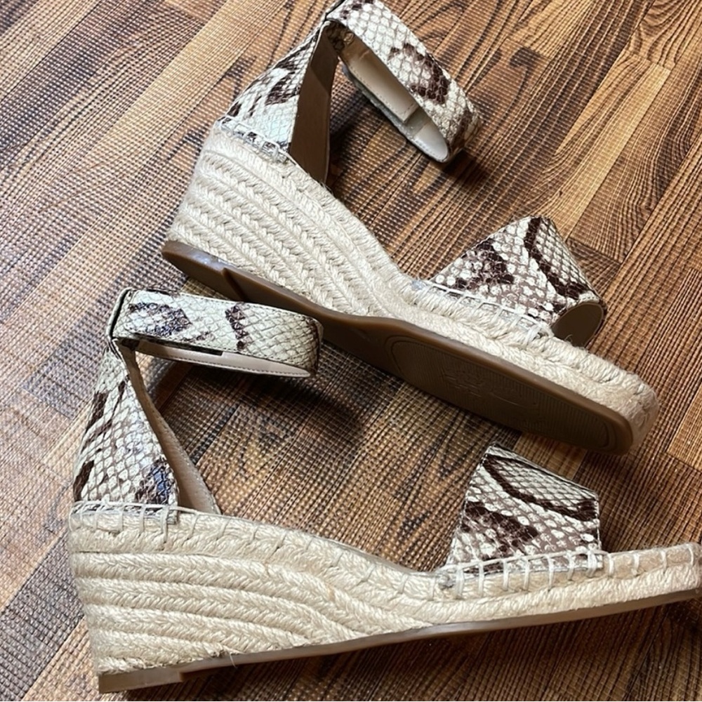 Vince Camuto, woman’s wedge sandals. Brown Snake skin print. Size 6W